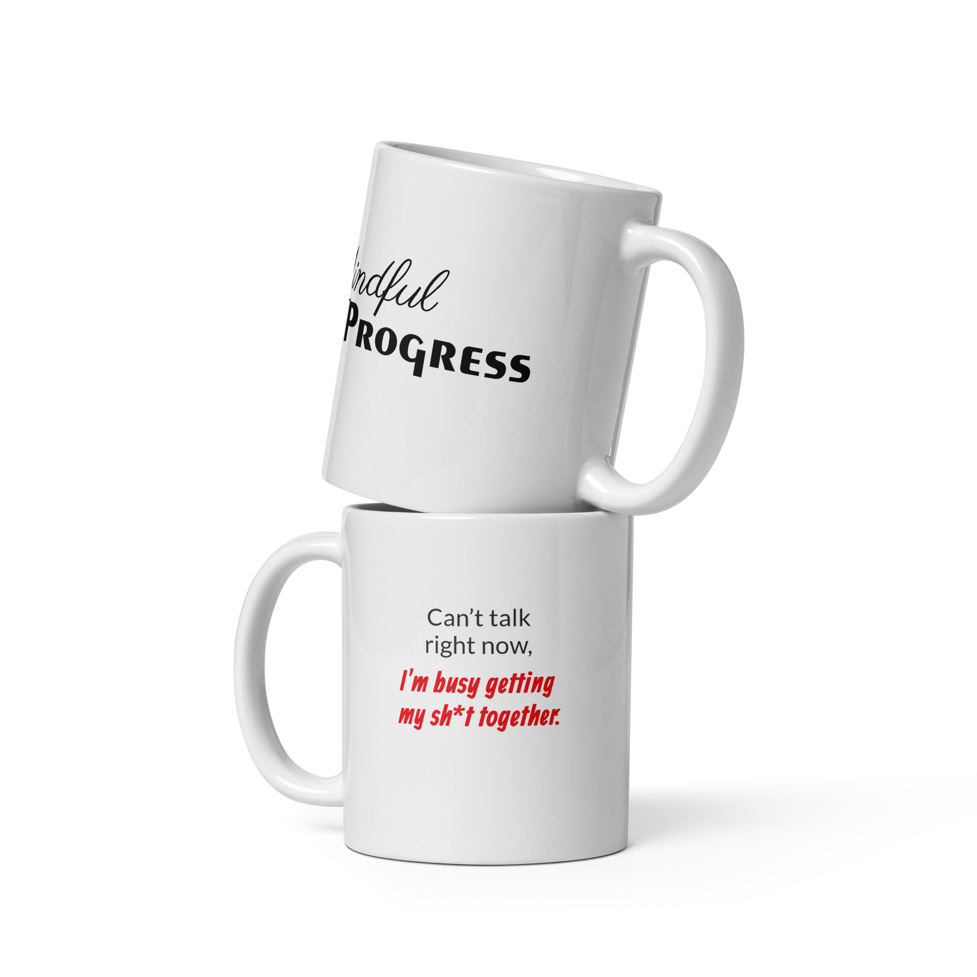 Two Mindful Progress mugs stacked on top showing the front and back 